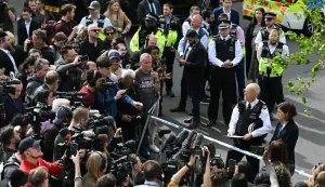 Metropolitan Police Commissioner Mark Rowley (2R) makes a statement to media from inside a Police cordon on Golders Green Road, in the Golders Green neighbourhood of north London, on April 29, 2026, after two people were stabbed, and a suspect arrested. The stabbing Wednesday of two Jewish men has been formally declared "a terrorist incident", London police said, with officers investigating "whether this attack was deliberately targeting the Jewish community". "Our highly specialised teams of officers are working... to progress this investigation quickly and establish exactly what has happened," said Assistant Commissioner Laurence Taylor, head of counter-terrorism policing. (Photo by JUSTIN TALLIS/AFP)