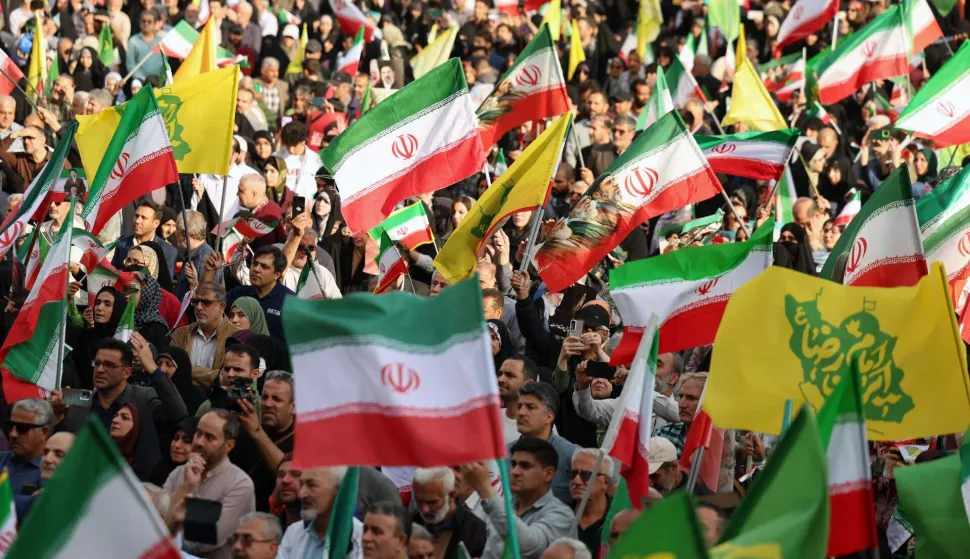 Iranians wave Iran?s national flags during a rally to show their solidarity and support to the new Iranian supreme leader Ayatollah Mojataba Khamenei in Tehran, on April 29, 2026. US President Donald Trump on April 29 warned Iran to "better get smart soon" as efforts by Washington and Tehran to end hostilities appeared at a standstill. (Photo by AFP)/