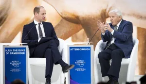 epa07309305 Britain's Prince William (L), The Duke of Cambridge, talks with British broadcaster and natural historian, Sir David Attenborough, during a plenary session in the Congress Hall of the 49th annual meeting of the World Economic Forum, WEF, in Davos, Switzerland, 22 January 2019. The meeting brings together entrepreneurs, scientists, corporate and political leaders in Davos under the topic 'Globalization 4.0' from 22 - 25 January 2019. EPA/GIAN EHRENZELLER