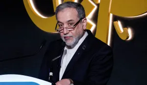 TOPSHOT - Iran?s Foreign Minister Abbas Araghchi looks on as he speaks during the 17th edition of the Al-Jazeera Forum in Doha on February 7, 2026. (Photo by Karim JAAFAR/AFP)