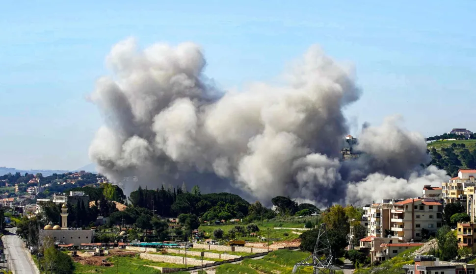 TOPSHOT - Smoke rises following Israeli bombardment on the town of Nabatieh in southern Lebanon on May 7, 2026. (Photo by Abbas Fakih/AFP)