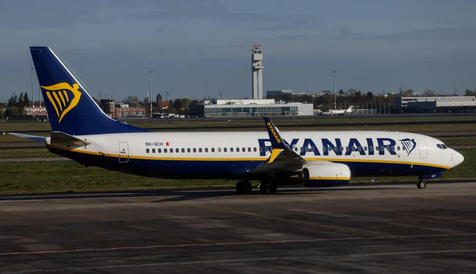 (FILES) An aircraft of low-cost Irish airline Ryanair taxis before take off the Berlin-Brandenburg airport in Schoenefeld near Berlin, on April 4, 2024. Irish budget airline Ryanair announced plans on April 24, 2026 to cut Berlin flights, blaming German aviation taxes and the airport's fees La compagnie a?rienne irlandaise Ryanair a annonc? vendredi qu'elle allait relocaliser ses avions actuellement bas?s ? Berlin, invoquant des taxes trop ?lev?es, ce qui divisera par deux son offre de vols au d?part et ? destination de la capitale allemande ? partir d'octobre. (Photo by David GANNON/AFP)
