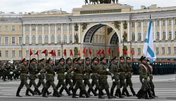 Russian honour guards soldiers march during a rehearsal for the Victory Day military parade at Dvortsovaya (Palace) Square in Saint Petersburg on April 23, 2026. (Photo by Olga MALTSEVA/AFP)