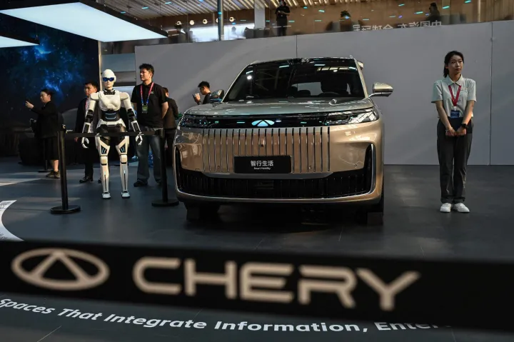 Chery?s Fengyun T11 SUV is on display at the Beijing Auto Show in Beijing on April 24, 2026. Thousands squeezed into the world's biggest car show on April 24, snapping selfies beside Chinese electric vehicles as automakers showcased AI, humanoid robots and flying-car ambitions in a cut-throat market. (Photo by Jade GAO/AFP)