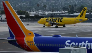 BURBANK, CALIFORNIA - APRIL 16: A Spirit Airlines plane taxis at Hollywood Burbank Airport on April 16, 2026 in Burbank, California. Facing mounting financial pressure, Spirit Airlines is at risk of liquidation within days as surging jet fuel costs tied to the Iran conflict strain its already fragile bankruptcy restructuring efforts. Justin Sullivan/Getty Images/AFP (Photo by JUSTIN SULLIVAN/GETTY IMAGES NORTH AMERICA/Getty Images via AFP)