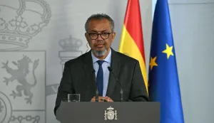 Spain's Prime Minister (out of frame) and World Health Organization (WHO) Director-General Tedros Adhanom Ghebreyesus give a joint press conference at the Moncloa Palace in Madrid on May 12, 2026. WHO chief said 'work not over' after hantavirus evacuation, AFP reports. (Photo by JAVIER SORIANO/AFP)