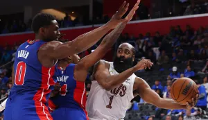 DETROIT, MICHIGAN - MAY 13: James Harden #1 of the Cleveland Cavaliers passes the ball against Jalen Duren #0 and Daniss Jenkins #24 of the Detroit Pistons during the third quarter in Game Five of the Second Round of the NBA Eastern Conference Playoffs at Little Caesars Arena on May 13, 2026 in Detroit, Michigan. NOTE TO USER: User expressly acknowledges and agrees that, by downloading and or using this photograph, User is consenting to the terms and conditions of the Getty Images License Agreement. Gregory Shamus/Getty Images/AFP (Photo by Gregory Shamus/GETTY IMAGES NORTH AMERICA/Getty Images via AFP)