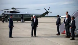 JOINT BASE ANDREWS, MARYLAND - MAY 15: U.S. President Donald Trump waves after stepping off Air Force One on May 15, 2026 at Joint Base Andrews, Maryland. President Trump is returning to Washington from his trip to China, where he and President Xi addressed ways to enhance bilateral economic cooperation and investment, and agreed that Iran should not be allowed to have a nuclear weapon. Alex Wong/Getty Images/AFP (Photo by ALEX WONG/GETTY IMAGES NORTH AMERICA/Getty Images via AFP)