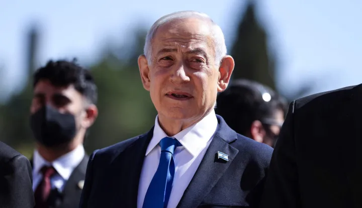 Israel?s Prime Minister Benjamin Netanyahu attends a wreath-laying ceremony marking the annual Holocaust Remembrance Day at the Yad Vashem Holocaust Memorial Museum in Jerusalem on April 14, 2026. Israel came to a standstill on April 14, as sirens sounded across the country in tribute to the six million Jews murdered by the Nazis during World War II. This year's commemoration comes amid a fragile two-week ceasefire with Iran after a deadly war that began on February 28, when a joint US-Israeli air attack killed Iran's supreme leader. (Photo by Ilia YEFIMOVICH/AFP)