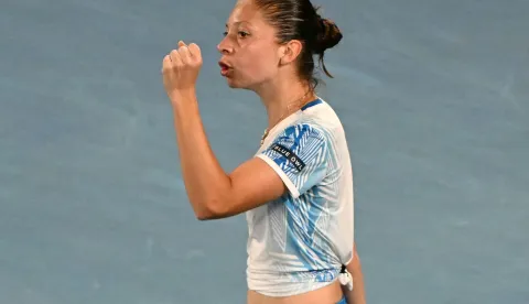 Croatia?s Antonia Ruzic reacts after a point against Japan's Naomi Osaka during their women's singles match on day three of the Australian Open tennis tournament in Melbourne on January 20, 2026. (Photo by Paul Crock/AFP)/-- IMAGE RESTRICTED TO EDITORIAL USE - STRICTLY NO COMMERCIAL USE --
