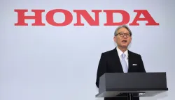 Honda President and CEO Toshihiro Mibe holds a press conference regarding the company's financial results in Tokyo on May 14, 2026. Honda announced on May 14, its first operational loss since 1957 after a major overhaul of its electric vehicle strategy in the United States. (Photo by JIJI PRESS/AFP)/Japan OUT