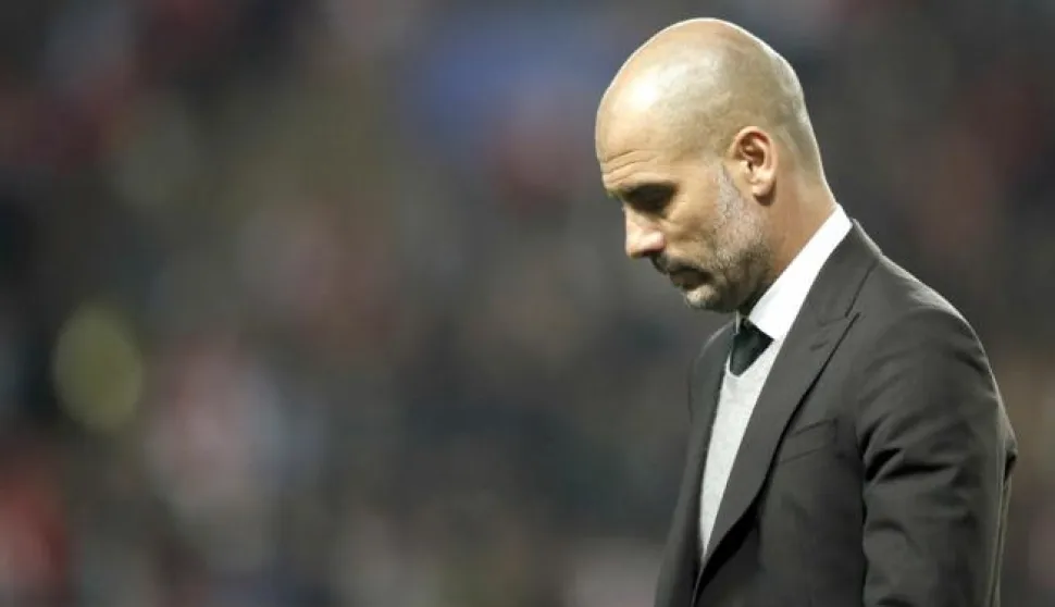 epa05850792 Manchester City's head coach Pep Guardiola reacts during the UEFA Champions League Round of 16, second leg soccer match between AS Monaco and Manchester City, at Stade Louis II, in Monaco, 15 March 2017. EPA/GUILLAUME HORCAJUELO