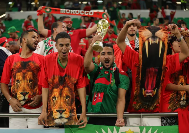 epa10359002 Fans of Morocco prior to the FIFA World Cup 2022 quarter final soccer match between Morocco and Portugal at Al Thumama Stadium in Doha, Qatar, 10 December 2022. EPA/Friedemann Vogel