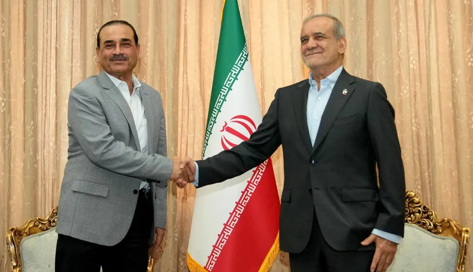 In this handout picture provided by the Iranian presidency, Iran's President Masoud Pezeshkian (R) meets with Pakistan?s Army Chief Syed Asim Munir in Tehran on May 23, 2026. Pakistan's powerful army chief arrived in Tehran on May 22 to bolster mediation between Iran and the US as weeks of negotiations since an April 8 ceasefire -- including historic face-to-face talks hosted by Islamabad -- have still not produced a permanent resolution or restored full access to the Hormuz strait, choking vast quantities of global oil supply. (Photo by Iranian Presidency/AFP)/=== RESTRICTED TO EDITORIAL USE - MANDATORY CREDIT "AFP PHOTO/HO/IRANIAN PRESIDENCY" - NO MARKETING NO ADVERTISING CAMPAIGNS - DISTRIBUTED AS A SERVICE TO CLIENTS ===