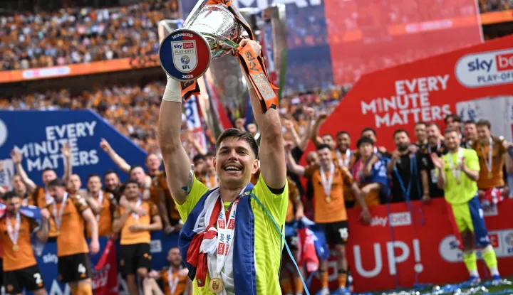 Hull City's Croatian goalkeeper #01 Ivor Pandur celebrates with the trophy after the English Championship play-off final football match between Hull City and Middlesbrough at Wembley Stadium in London on May 23, 2026. Hull won the game 1-0. (Photo by Paul ELLIS/AFP)/NOT FOR MARKETING OR ADVERTISING USE/RESTRICTED TO EDITORIAL USE