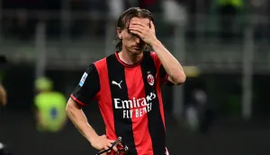 AC Milan's Croatian midfielder #14 Luka Modric reacts at the end of the Italian Serie A football match between AC Milan and Cagliari at the San Siro Stadium in Milan on May 24, 2026. (Photo by Piero CRUCIATTI/AFP)