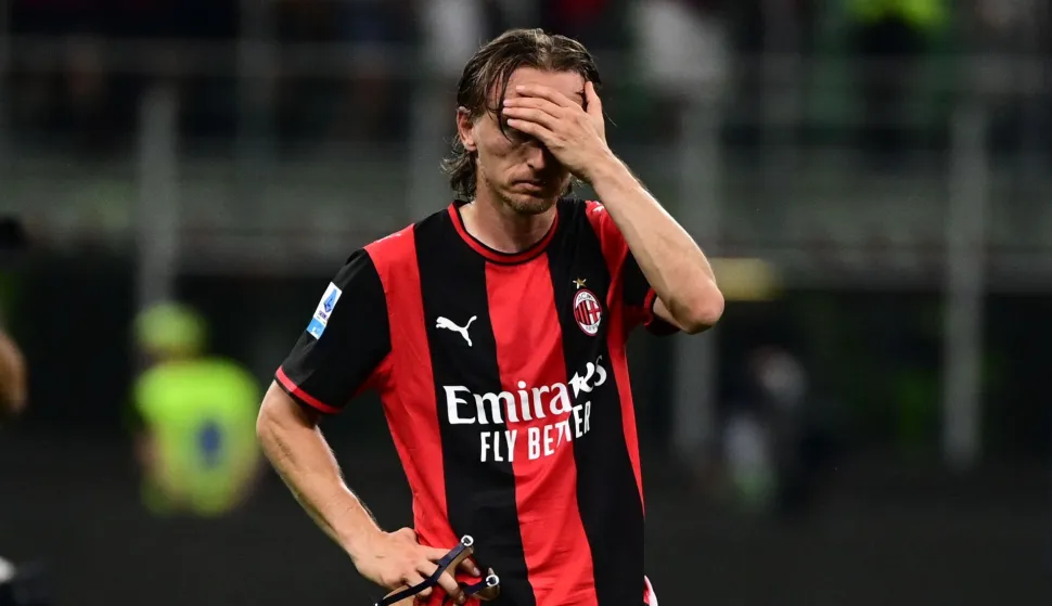AC Milan's Croatian midfielder #14 Luka Modric reacts at the end of the Italian Serie A football match between AC Milan and Cagliari at the San Siro Stadium in Milan on May 24, 2026. (Photo by Piero CRUCIATTI/AFP)