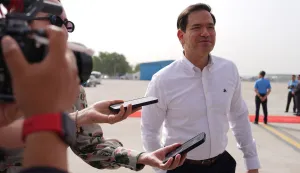 US Secretary of State Marco Rubio speaks to journalists before boarding his plane at Indira Gandhi International Airport in New Delhi on May 25, 2026. (Photo by Julia Demaree Nikhinson/POOL/AFP)