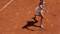 Croatia's Donna Vekic plays a forehand return to Japan's Naomi Osaka during their women's singles match on day 5 of the French Open tennis tournament on Court Simonne-Mathieu at the Roland-Garros Complex in Paris on May 28, 2026. (Photo by Thomas SAMSON/AFP)