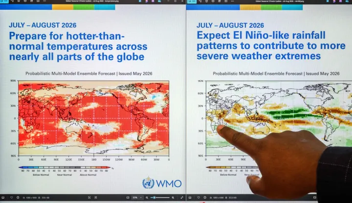 Head of climate prediction services at the World Meteorological Organization (WMO) Wilfran Moufouma-Okia points on graphs displayed on a computer screen at the WMO headquarters in Geneva, on June 1, 2026. There is an 80-percent chance of the warming El Nino phenomenon developing between June and August, increasing the risk of extreme weather events, the World Meteorological Organization said on June 2, 2026. (Photo by Fabrice COFFRINI/AFP)