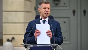 Hungary?s Prime Minister Peter Magyar handles paper sheets during a door-step presser after a meeting with Hungary's President at the presidential office in Sandor-palace, Budapest, Hungary, on June 1, 2026. The meeting takes place a day after a deadline set out by Magyar for the resignation of Sulyok has passed. The prime minister has urged top state officials, whom he called puppets of his predecessor, to step down by the end of May or face removal from office. (Photo by Attila KISBENEDEK/AFP)