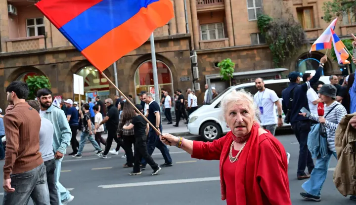 Supporters of Strong Armenia, the party of billionaire Russian-Armenian businessman Samvel Karapetyan - who is under house arrest on charges of plotting a coup, stage a campaign march in Yerevan on June 3, 2026, days ahead of the parliamentary elections. (Photo by Karen MINASYAN/AFP)