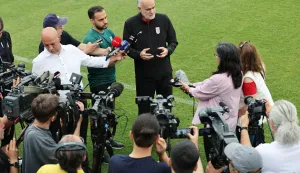 First Vice President of the Islamic Republic of Iran Football Federation Mahdi Mohammadnabi (C) addresses the media during a training session at the Iranian team's base camp in Antalya on May 19, 2026. Iran's national football team arrived in Turkey on May 19, 2026 for a training camp and to complete visa applications ahead of the 2026 World Cup, AFP correspondents said. (Photo by Oner SAN/AFP)