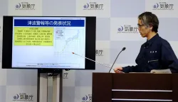 An official from the Japan Meteorological Agency's Earthquake and Tsunami Countermeasures Planning Office holds a press conference in Tokyo on June 8, 2026, regarding a tsunami warning issued in response to an offshore earthquake that struck some 24 kilometres west of Mindanao island in the southern Phlippines. Japanese authorities issued a tsunami advisory on June 8 along swathes of its Pacific coast after a major earthquake off the Philippines. (Photo by JIJI PRESS/AFP)/Japan OUT