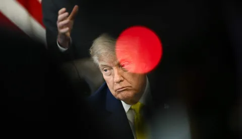 US President Donald Trump looks on during an announcement about coal, in the Oval Office of the White House in Washington, DC on June 4, 2026. President Trump on Thursday announced he was using Cold War era legislation to tap 0 million in funding for a slew of coal plants and mines and an export terminal. (Photo by Brendan SMIALOWSKI/AFP)