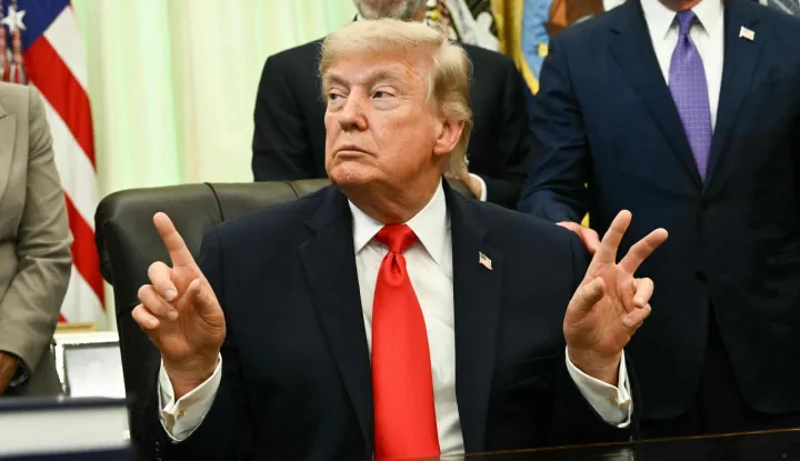 TOPSHOT - US President Donald Trump speaks before signing a proclamation in the Oval Office of the White House in Washington, DC, on June 11, 2026. (Photo by Kent NISHIMURA/AFP)