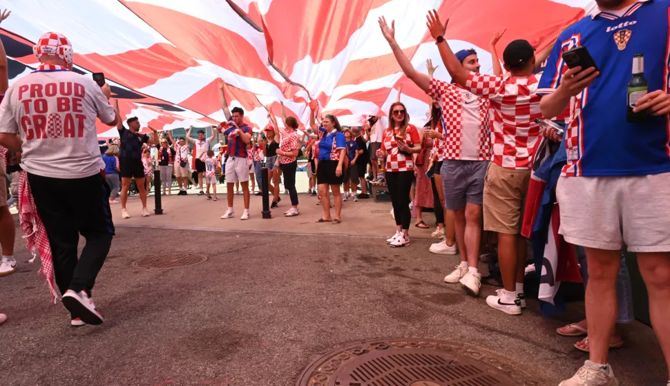 Members of the Croatian diaspora community unfurl a massive 100-meter-long checkerboard flag at Anable Basin along the Queens waterfront in Long Island City, NY, June 13, 2026.&nbsp;(Photo by Efren Landaos/Sipa USA) Photo: Efren Landaos/SIPA USA