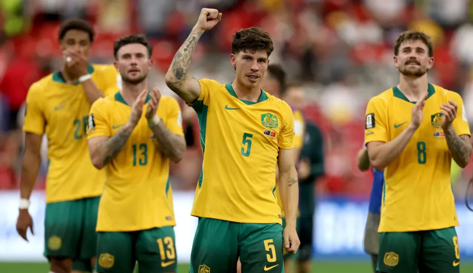 VANCOUVER, BRITISH COLUMBIA - JUNE 13: Jordan Bos #5 and players of Australia applaud fans after the team's 2-0 victory in the FIFA World Cup 2026 Group D match between Australia and T?rkiye at BC Place Vancouver on June 13, 2026 in Vancouver, British Columbia. Dean Mouhtaropoulos/Getty Images/AFP (Photo by Dean Mouhtaropoulos/GETTY IMAGES NORTH AMERICA/Getty Images via AFP)