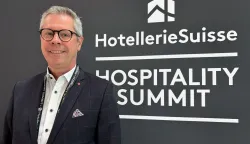 Head of the industry association HotellerieSuisse, Martin von Moos poses during the Hospitality Summit in Bern, on June 3, 2026. Swiss business leaders and unions are mobilising ahead of a vote on June 14, 2026 on capping immigration, which has triggered fears of dire impacts on employment and trade relations with the European Union. The vote will focus on a proposal by the hard-right Swiss People's Party (SVP) aimed at keeping the wealthy Alpine nation's population -- currently 9.1 million -- below 10 million until 2050. (Photo by Nathalie OLOF-ORS/AFP)