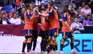 Spain players celebrate after scoring a goal during the international friendly football match between Peru and Spain at Cuauhtemoc Stadium in Puebla, Mexico, on June 8, 2026. (Photo by CARL DE SOUZA/AFP)