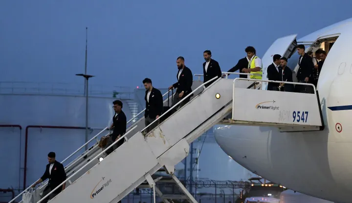 Iran's players disembark on arrival at the Tijuana International Airport in Tijuana, Mexico on June 7, 2026, ahead of the FIFA 2026 World Cup football tournament. (Photo by Guillermo Arias/AFP)