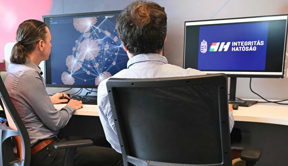 Officials of 'Integritas Hatosag', Hungary's anti-corruption watchdog Integrity Authority, work their office in Budapest, Hungary, on June 10, 2026. Hungary's government introduced wide-ranging draft anti-corruption legislation on June 9, 2026 as it seeks to implement reforms to access billions of euros in withheld European Union funds. (Photo by Attila KISBENEDEK/AFP)