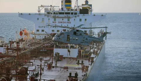 This handout picture taken on June 14, 2026 and released by the British Ministry of Defence (MOD) shows 42 Commando of the UK Commando force conducting maritime interdiction operations on the CMR Smyrtos sailing under a false Cameroonian flag, in the English Channel off the coast of the United Kingdom. British forces on June 14 intercepted a sanctioned oil tanker belonging to Russia's shadow fleet in the English Channel, the defence ministry said, in a six-hour operation hailed by Kyiv. (Photo by Ministry of Defence (United Kingdom)/AFP)/- NO Marketing campaign/-----EDITORS NOTE --- RESTRICTED TO EDITORIAL USE - MANDATORY CREDIT "AFP PHOTO/UK Ministry of Defence CROWN COPYRIGHT, 2026 " - NO MARKETING - NO ADVERTISING CAMPAIGNS - DISTRIBUTED AS A SERVICE TO CLIENTS - NO ARCHIVES - TO BE USED WITHIN 2 DAYS FROM JUNE 14, 2026 (48 HOURS), EXCEPT FOR MAGAZINES WHICH CAN PRINT THE PICTURE WHEN FIRST REPORTING ON THE EVENT/