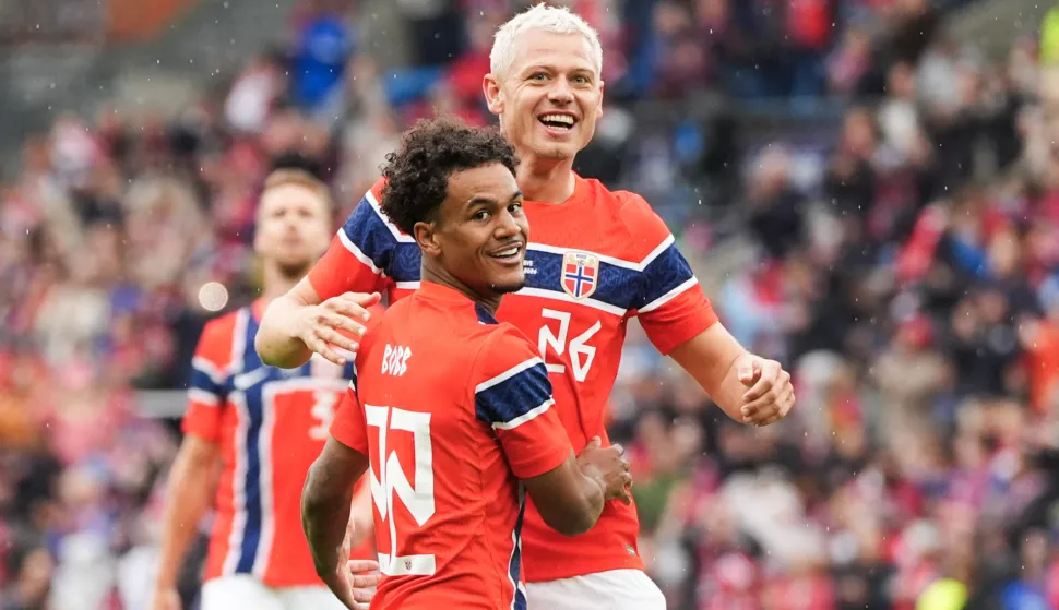 Norway's midfielder #20 Antonio Nusa (C) celebrates scoring the 2-0 goal with his teammates including Norway's defender #26 Julian Ryerson during the friendly match between Norway and Sweden at Ullevaal Stadium, on June 1, 2026 ahead of the 2026 FIFA World Cup football tournament. (Photo by Lise ?serud/NTB/AFP)/Norway OUT