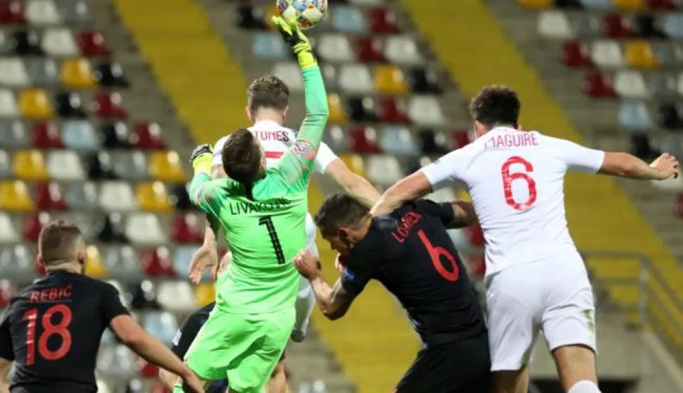 Zagreb, 12.10.2018. - Drugo kolo A skupine nogometne Lige nacije Hrvatska - Engleska. Na fotografiji Ante Rebić, Dominik Livaković, Dejan Lovren, Harry Maguire. foto HINA/ Daniel KASAP/ dk