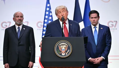 US President Donald Trump (C) addresses the media alongside US Secretary of State Marco Rubio (R) and US Commerce secretary Howard Lutnick (L) during a closing press conference at the G7 summit, in Evian, eastern France, on June 17, 2026. A G7 summit is set to take place June 15 to 17 in the French town of Evian-les-Bains near Switzerland and it will be attended by country leaders as well as the EU's foreign policy chief and ministers from Brazil, Canada, the United Arab Emirates and Turkey. (Photo by Mandel NGAN/AFP)