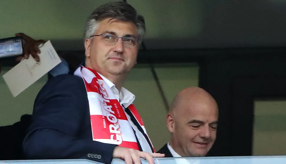 Moskva, 11.07.2018. - Polufinalna utakmica Svjetskog nogometnog prvenstva Rusija 2018 između reprezentacija Hrvatske i Engleske na stadionu Lunjiki. Na fotografiji premijer Andrej Plenković, predsjednik Fife Gianni Infantino, predsjednik HNS-a Davor uker. foto HINA/ Damir SENČAR/ lsd