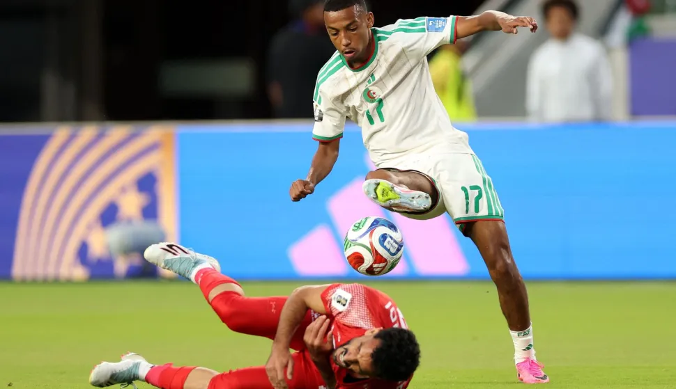 SANTA CLARA, CALIFORNIA - JUNE 22: Mahmoud Almardi #13 of Jordan reacts after a challenge with Rafik Belghali #17 of Algeria during the FIFA World Cup 2026 Group J match between Jordan and Algeria at San Francisco Bay Area Stadium on June 22, 2026 in Santa Clara, California. Stu Forster/Getty Images/AFP (Photo by Stu Forster/GETTY IMAGES NORTH AMERICA/Getty Images via AFP)