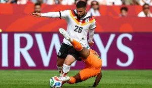 Germany's forward #26 Deniz Undav and Ivory Coast's midfielder #26 Christ Inao Oulai fight for the ball during the 2026 World Cup Group E football match between Germany and Ivory Coast at the Toronto Stadium in Toronto on June 20, 2026. (Photo by Cole Burston/AFP)