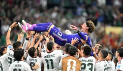 TOPSHOT - Mexico's players lift up goalkeeper #13 Guillermo Ochoa after winning the 2026 World Cup Group A football match between the Czech Republic and Mexico at the Mexico City Stadium in Mexico City on June 24, 2026. (Photo by CARL DE SOUZA/AFP)