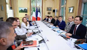 France's President Emmanuel Macron, Italy's Prime Minister Giorgia Meloni and members of their government attend a Franco-Italian summit in Antibes, French Riviera, on June 25, 2026. The talks mark the first Franco-Italian summit since a treaty on a strategic alliance came into force in 2021, elevating relations to a level comparable to that between France and Germany. (Photo by Manon Cruz/POOL/AFP)