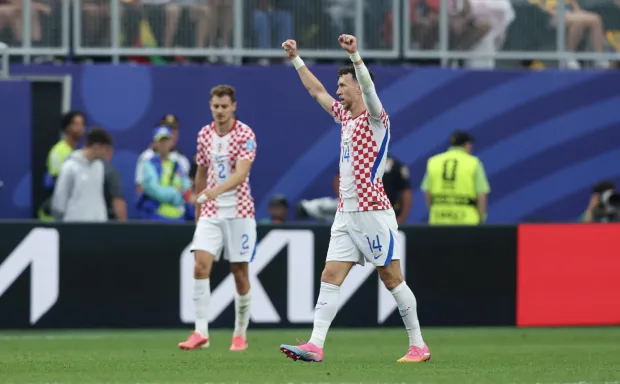 Philadelphia, 28.06.2026 - Utakmica trećeg kola skupine L Svjetskog nogometnog prvenstva Hrvatska - Gana na Lincoln Financial Field stadionu u Philadelphiji. Na slici hrvatski nogometa&scaron;i slave pobjedu, Ivan Peri&scaron;ić, Josip Stani&scaron;ić.foto HINA/ Daniel KASAP/ ds