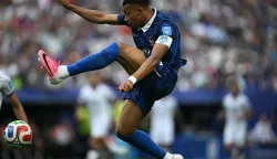 TOPSHOT - France's forward #10 Kylian Mbappe jumps during the 2026 World Cup Group I football match between France and Iraq at the Philadelphia Stadium in Philadelphia on June 22, 2026. (Photo by MAURO PIMENTEL/AFP)