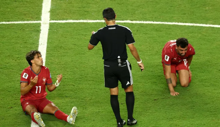 MIAMI GARDENS, FLORIDA - JUNE 27: Joao Felix #11 of Portugal speaks to referee Alireza Faghani during the FIFA World Cup 2026 Group K match between Colombia and Portugal at Miami Stadium on June 27, 2026 in Miami Gardens, Florida. Megan Briggs/Getty Images/AFP (Photo by Megan Briggs/GETTY IMAGES NORTH AMERICA/Getty Images via AFP)