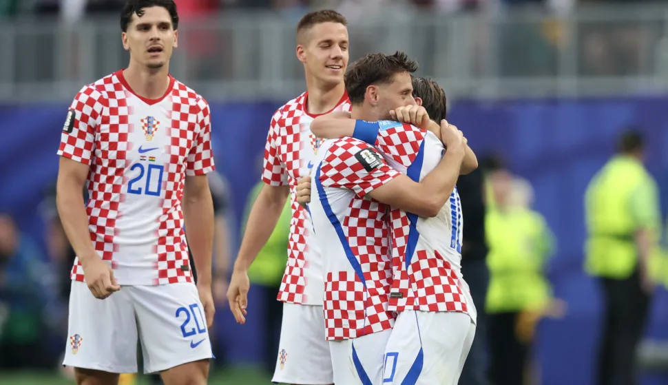 Philadelphia, 28.06.2026 - Utakmica trećeg kola skupine L Svjetskog nogometnog prvenstva Hrvatska - Gana na Lincoln Financial Field stadionu u Philadelphiji. Na slici Nikola Vla&scaron;ić, Luka Modrić, Mario Pa&scaron;alić, Igor Matanović slave zgodita koji je postigao Nikola Vla&scaron;ić.foto HINA/ Daniel KASAP/ ds