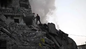 Rescuers extinguish a fire and work in a damaged residential building following missile strikes on the Ukrainian capital of Kyiv on July 2, 2026, amid the Russian invasion of Ukraine. Russian missile and drone strikes rocked Kyiv early on July 2, killing at least eight people and wounding dozens, after President Volodymyr Zelensky warned that Moscow was preparing a "massive attack". (Photo by Genya SAVILOV/AFP)